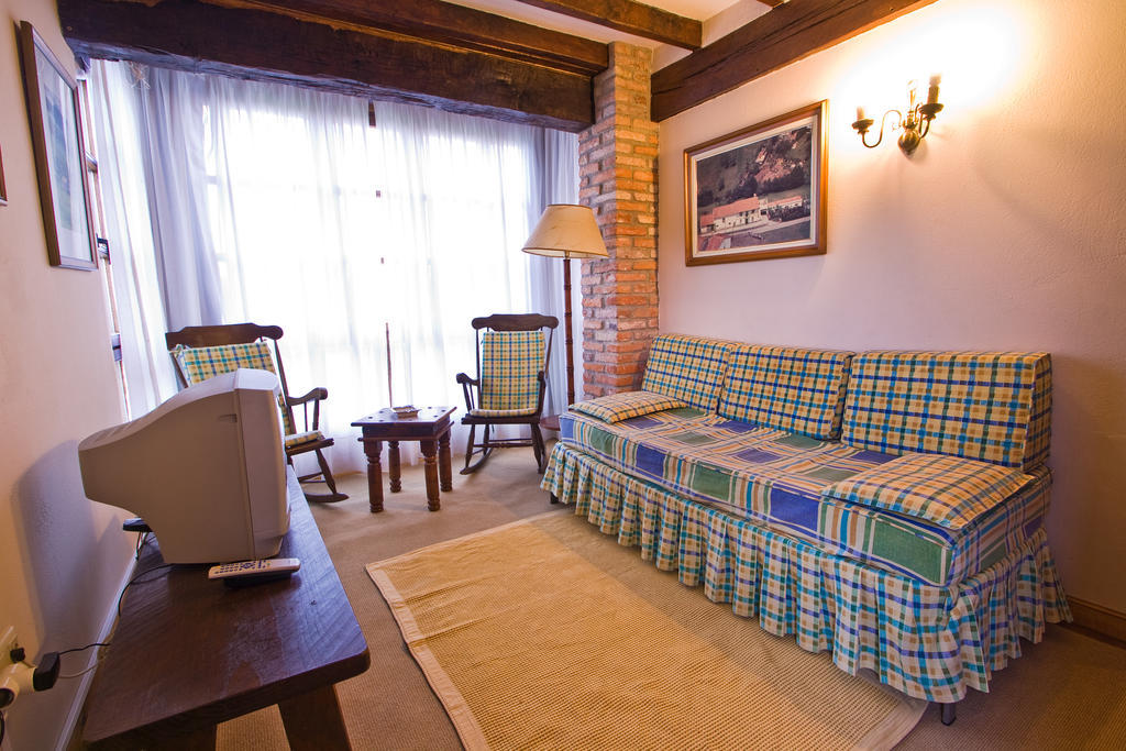 Vivienda Casa Luisa Apartment โกมิญาส ห้อง รูปภาพ